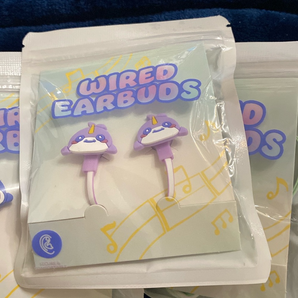 COPY - Kids wired earbuds. Colors purple, green, and blue